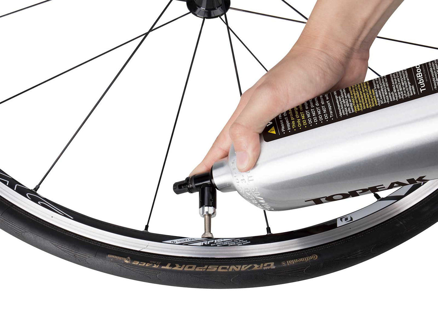 Topeak TubiBooster Pomp de velg direct op met perslucht om de hielrand van de tubeless band te monteren.